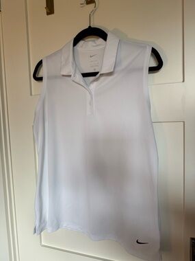 NIKE women’s dri fit polo SZ L
